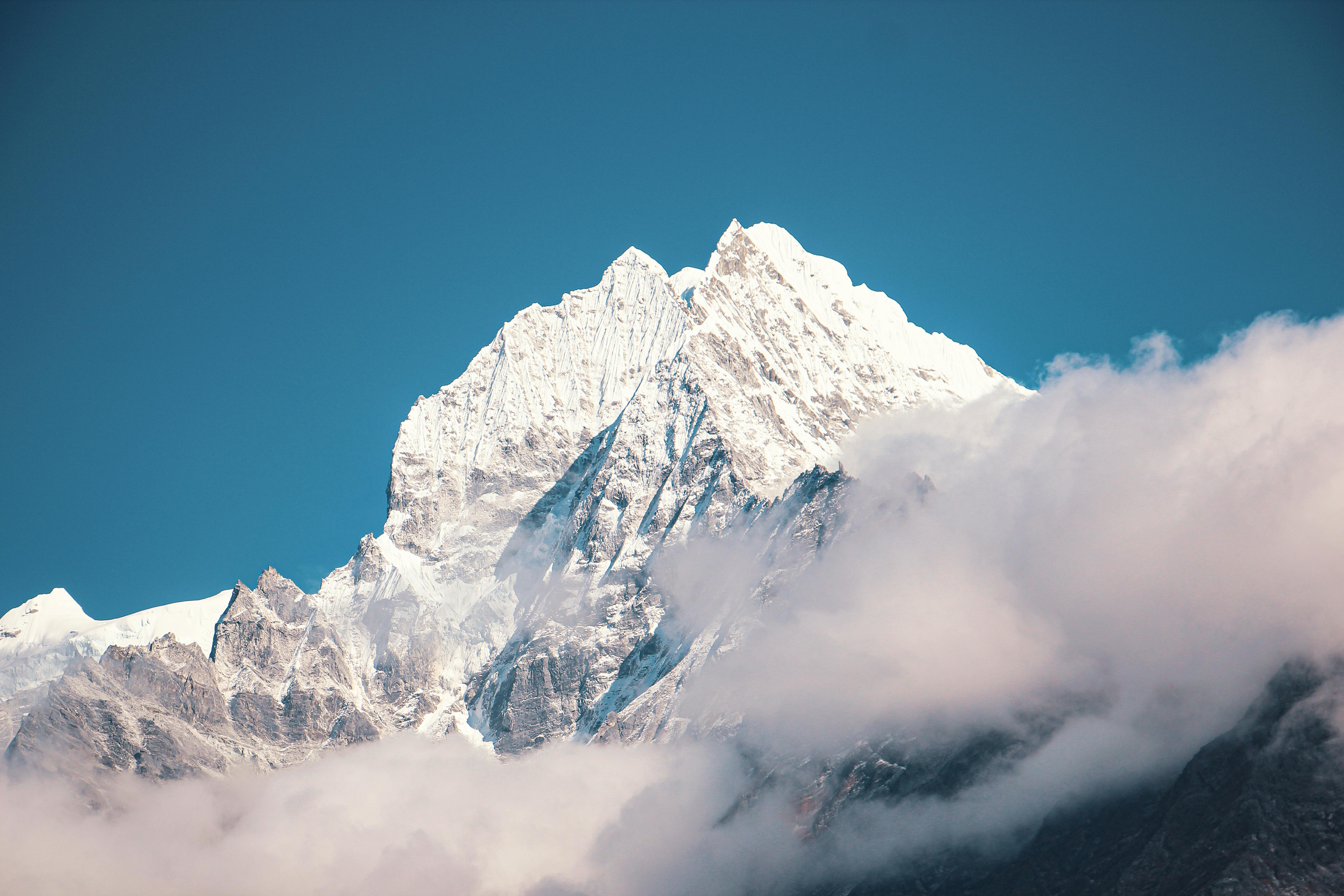 Photo by Sulav Loktam: https://www.pexels.com/photo/snow-covered-mountain-under-blue-sky-4360488/